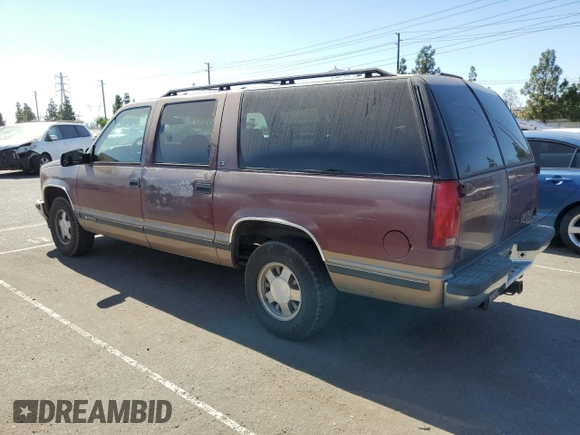 1997 Chevrolet Suburban with VIN 1GNEC16R4VJ418725, listed as a Copart auction lot 75766084 with 216,722 mi miles and Salvage Title. Bid and sale history available at carsss.com. Image 2.