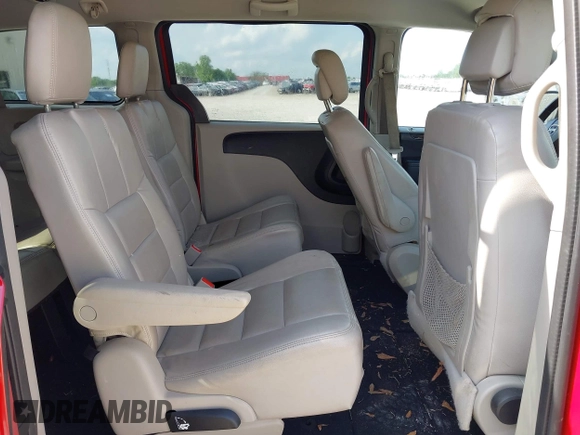 2014 Dodge Grand Caravan American Value with VIN 2C4RDGBG6ER309449, listed as a IAAI auction lot 42148824 with 198,532 mi miles and . Bid and sale history available at DreamBid. Image 8.