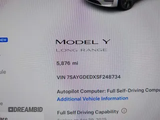 2025 Tesla Model Y Long Range with VIN 7SAYGDEDXSF248734, listed as a IAAI auction lot 41719195 with 5,876 mi miles and . Bid and sale history available at DreamBid. Image 7.