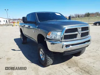 2012 Ram 2500 ST z VIN 3C6UD5CL4CG284698, wystawiony jako IAAI lot #41805451 z przebiegiem 199 351 mil mil oraz . Historia ofert i sprzedaży dostępna na DreamBid. Obrazek 1.