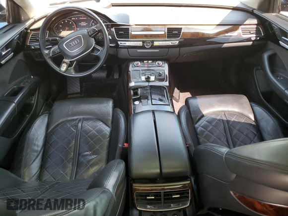 2017 Audi A8 with VIN WAU44AFD0HN006074, listed as a Copart auction lot 52421465 with 144,744 mi miles and Salvage title. Bid and sale history available at DreamBid. Image 8.