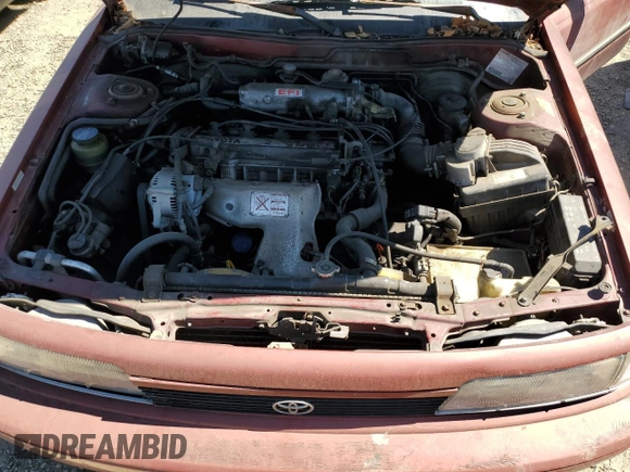 1990 Toyota Camry LE ECT z VIN JT2SV22E0L0351440, wystawiony jako Copart lot #70768614 z przebiegiem 176 239 mil mil oraz Szkoda całkowita • Salvage title. Historia ofert i sprzedaży dostępna na DreamBid. Obrazek 11.