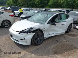 2023 Tesla Model 3 with VIN 5YJ3E1EA4PF644621, listed as a IAAI auction lot 42280312 with 41,262 mi miles and . Bid and sale history available at DreamBid. Image 6.