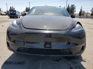 2024 Tesla Model Y Long Range with VIN 7SAYGDEE0RF123793, listed as a Copart auction lot 57177305 with 20,053 mi miles and Salvage title. Bid and sale history available at DreamBid. Image 5.