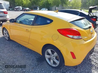 2012 Hyundai Veloster w/Gray Int with VIN KMHTC6AD2CU079902, listed as a IAAI auction lot 42088473 with 143,983 mi miles. Bid and sale history available at carsss.com. Image 3.