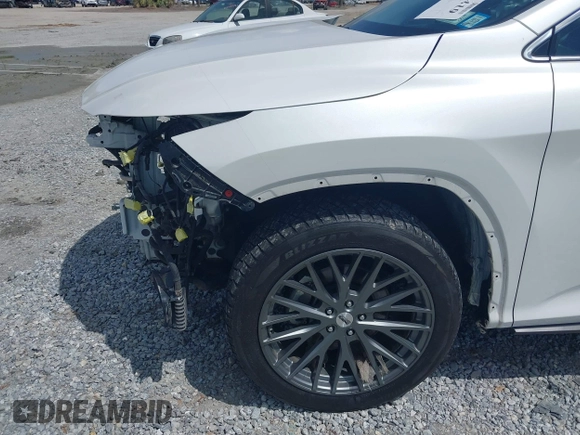 2021 Lexus RX with VIN 2T2JGMDA9MC058061, listed as a IAAI auction lot 42031419 with 40,698 mi miles. Bid and sale history available at carsss.com. Image 6.