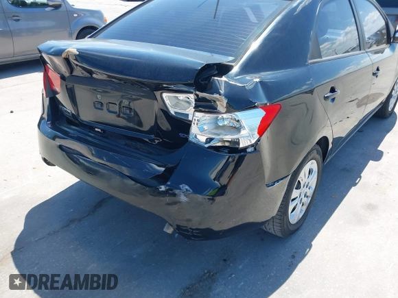 2010 Kia Forte EX with VIN KNAFU4A20A5847351, listed as a IAAI auction lot 41897921 with 129,084 mi miles. Bid and sale history available at carsss.com. Image 6.