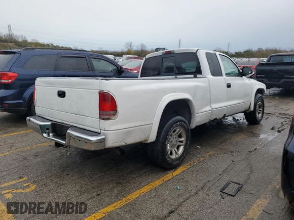 2003 Dodge Dakota SLT with VIN 1D7HL42X33S151165, listed as a Copart auction lot 78040874 with 84,766 mi miles and Salvage Title. Bid and sale history available at carsss.com. Image 3.