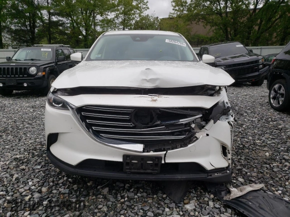 2022 Mazda CX-9 Touring with VIN JM3TCBCYXN0619317, listed as a Copart auction lot 58264755 with 139,478 mi miles and Salvage title. Bid and sale history available at DreamBid. Image 5.