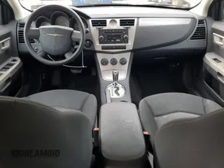 2009 Chrysler Sebring LX z VIN 1C3LC46B19N500211, wystawiony jako Copart lot #56856615 z przebiegiem 66 799 mil mil oraz Szkoda całkowita • Salvage title. Historia ofert i sprzedaży dostępna na DreamBid. Obrazek 8.