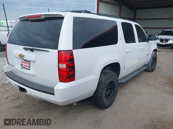 2013 Chevrolet Suburban LT with VIN 1GNSCJE05DR147101, listed as a IAAI auction lot 42336950 with 147,429 mi miles and . Bid and sale history available at DreamBid. Image 4.