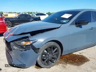 2023 Mazda 3 S Carbon Edition with VIN JM1BPBLM8P1611106, listed as a IAAI auction lot 42191902 with 37,244 mi miles and . Bid and sale history available at DreamBid. Image 6.
