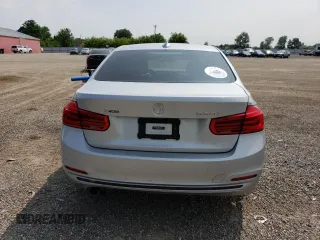 2018 BMW 3 Series 330i xDrive with VIN WBA8D9C54JEM34426, listed as a Copart auction lot 60487205 with 158,224 mi miles and Salvage title. Bid and sale history available at DreamBid. Image 6.