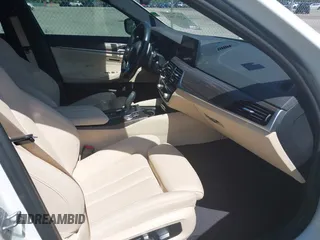 2019 BMW 5 Series 530i with VIN WBAJA5C5XKWW33575, listed as a IAAI auction lot 42217081 with 55,379 mi miles and . Bid and sale history available at DreamBid. Image 5.