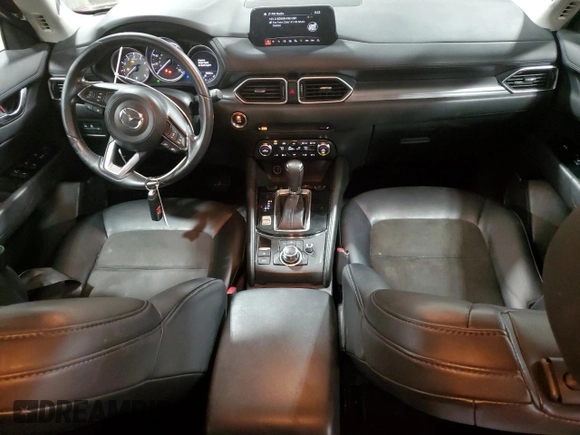 2018 Mazda CX-5 Touring z VIN JM3KFBCM5J0462676, wystawiony jako Copart lot #57892015 z przebiegiem 76 566 mil mil oraz Szkoda całkowita • Salvage title. Historia ofert i sprzedaży dostępna na DreamBid. Obrazek 8.