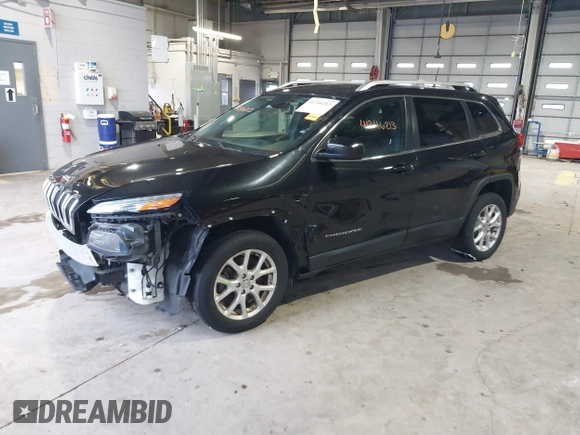 2015 Jeep Cherokee Latitude with VIN 1C4PJMCB5FW768854, listed as a IAAI auction lot 41246213 with 131,112 mi miles. Bid and sale history available at carsss.com. Image 2.