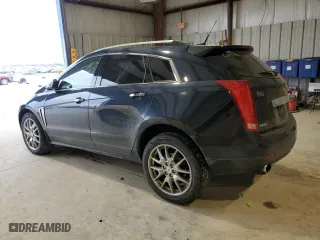 2014 Cadillac SRX Performance Collection with VIN 3GYFNCE3XES646141, listed as a Copart auction lot 47273365 with 126,816 mi miles and Salvage Title. Bid and sale history available at carsss.com. Image 2.