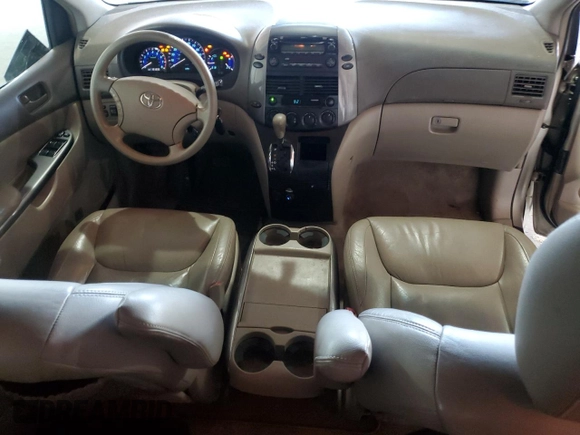 2010 Toyota Sienna CE with VIN 5TDKK4CC3AS331556, listed as a Copart auction lot 46590115 with 151,835 mi miles and Salvage Title. Bid and sale history available at DreamBid. Image 8.