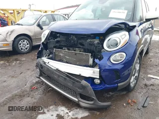2015 FIAT 500L Urbana Trekking with VIN ZFBCFADH6FZ036980, listed as a IAAI auction lot 41640698 with 106,526 mi miles and . Bid and sale history available at DreamBid. Image 18.