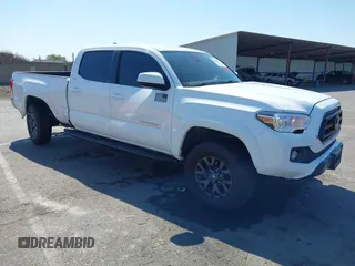 2020 Toyota Tacoma SR5 with VIN 3TMDZ5BN3LM094549, listed as a IAAI auction lot 42643861 with 81,901 mi miles and . Bid and sale history available at DreamBid. Image 1.