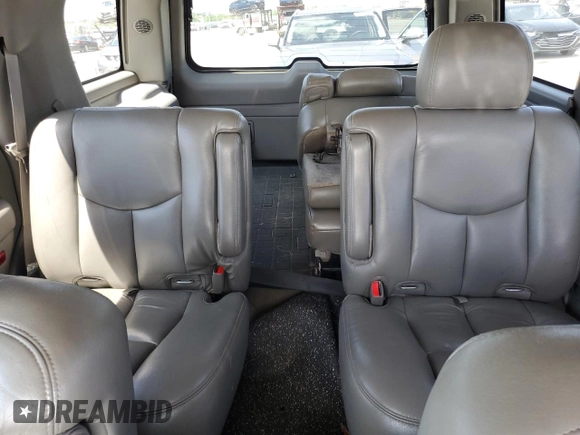 2004 Chevrolet Tahoe LS z VIN 1GNEC13Z14R277634, wystawiony jako Copart lot #56374955 z przebiegiem 247 285 mil mil oraz Szkoda całkowita • Salvage title. Historia ofert i sprzedaży dostępna na DreamBid. Obrazek 10.