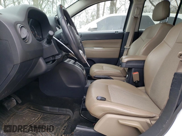 2016 Jeep Compass High Altitude Edition with VIN 1C4NJCEA0GD769610, listed as a Copart auction lot 52746435 with 136,849 mi miles and Salvage Title. Bid and sale history available at carsss.com. Image 7.