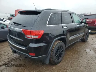 2013 Jeep Grand Cherokee Overland with VIN 1C4RJFCT9DC615096, listed as a Copart auction lot 86817074 with 112,421 mi miles and Salvage Title. Bid and sale history available at carsss.com. Image 3.