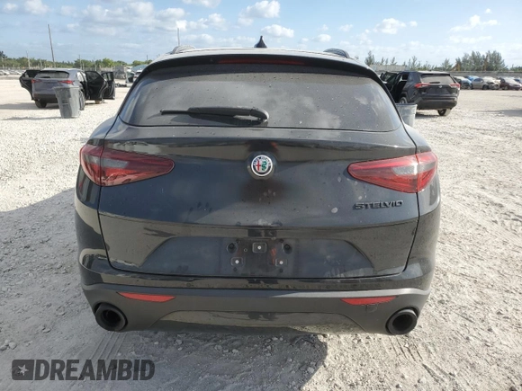 2019 Alfa Romeo Stelvio z VIN ZASPAJAN7K7C61221, wystawiony jako Copart lot #54795485 z przebiegiem 46 377 mil mil oraz Nie do naprawy. Historia ofert i sprzedaży dostępna na DreamBid. Obrazek 6.