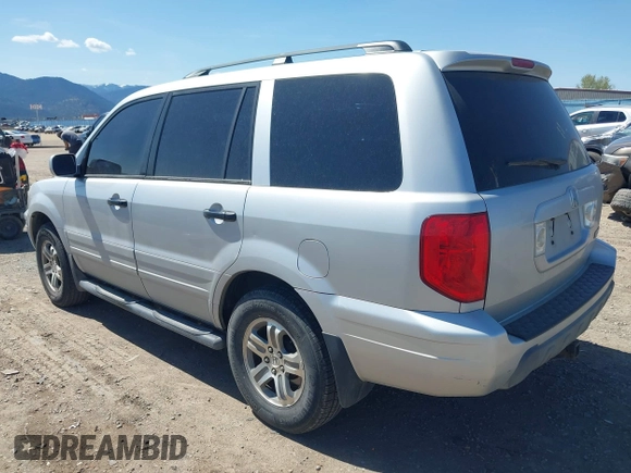 2003 Honda Pilot EX with VIN 2HKYF185X3H602354, listed as a IAAI auction lot 42151828 with 210,440 mi miles and . Bid and sale history available at DreamBid. Image 3.