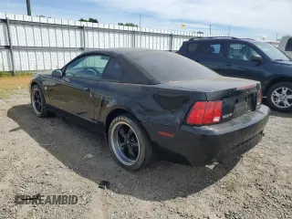 2004 Ford Mustang Standard with VIN 1FAFP40464F100368, listed as a Copart auction lot 51221794 with 174,711 mi miles and Salvage Title. Bid and sale history available at carsss.com. Image 2.