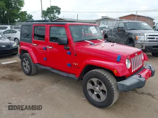 2018 Jeep Wrangler Unlimited Sahara with VIN 1C4HJWEGXJL925135, listed as a IAAI auction lot 42602783 with 92,254 mi miles and . Bid and sale history available at DreamBid. Image 1.