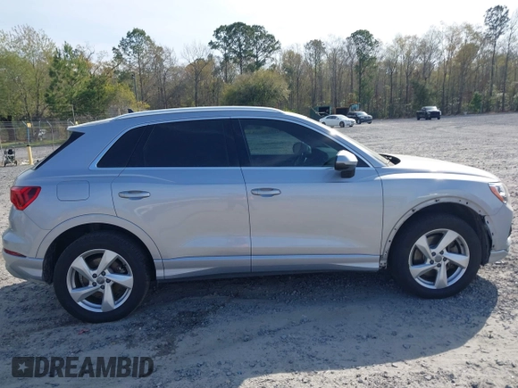 2020 Audi Q3 Premium with VIN WA1AECF36L1057823, listed as a IAAI auction lot 41912118 with 71,004 mi miles and . Bid and sale history available at DreamBid. Image 13.