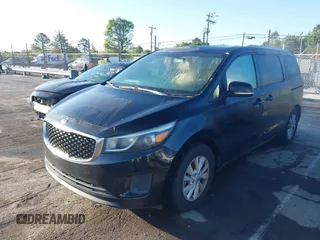 2016 Kia Sedona LX with VIN KNDMB5C15G6090413, listed as a IAAI auction lot 41991231 with 162,326 mi miles. Bid and sale history available at carsss.com. Image 2.