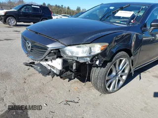 2015 Mazda 6 i Touring with VIN JM1GJ1V60F1170067, listed as a IAAI auction lot 41259559 with 131,055 mi miles and . Bid and sale history available at DreamBid. Image 6.