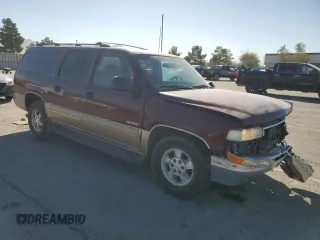 2000 Chevrolet Suburban LS with VIN 3GNEC16T2YG160819, listed as a Copart auction lot 77664344 with 200,816 mi miles and Salvage title. Bid and sale history available at DreamBid. Image 4.