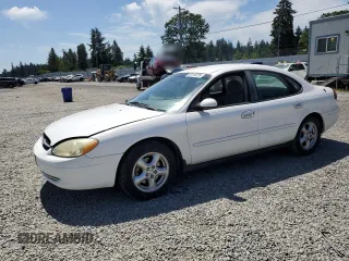 2003 Ford Taurus SE Standard z VIN 1FAFP53U43G106132, wystawiony jako Copart lot #60145225 z przebiegiem 56 496 mil mil oraz Szkoda całkowita • Salvage title. Historia ofert i sprzedaży dostępna na DreamBid. Obrazek 1.