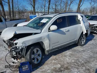 2014 Jeep Compass Latitude with VIN 1C4NJCEB1ED560365, listed as a IAAI auction lot 41348657 with 108,931 mi miles. Bid and sale history available at carsss.com. Image 2.