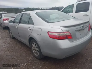 2007 Toyota Camry CE with VIN 4T1BE46K77U513111, listed as a IAAI auction lot 41561545 with 310,776 mi miles. Bid and sale history available at carsss.com. Image 3.