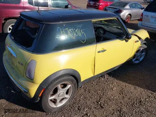 2003 MINI Cooper Hardtop with VIN WMWRC33423TC45741, listed as a IAAI auction lot 41013720 with 999,999 mi miles. Bid and sale history available at carsss.com. Image 4.