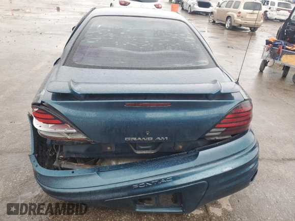 2002 Pontiac Grand Am SE z VIN 1G2NE52F92C172605, wystawiony jako Copart lot #56541555 z przebiegiem 164 600 mil mil oraz Szkoda całkowita • Salvage title. Historia ofert i sprzedaży dostępna na DreamBid. Obrazek 6.