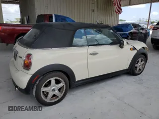2010 MINI Convertible with VIN WMWMR3C59ATU98597, listed as a Copart auction lot 53336025 with 88,273 mi miles and Salvage Title. Bid and sale history available at DreamBid. Image 3.