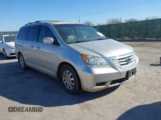 2009 Honda Odyssey EX-L with VIN 5FNRL38619B038800, listed as a IAAI auction lot 41744792 with 235,977 mi miles. Bid and sale history available at carsss.com. Image 1.
