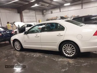 2008 Mercury Milan Premier with VIN 3MEHM08Z38R604372, listed as a IAAI auction lot 41131598 with 104,302 mi miles and . Bid and sale history available at DreamBid. Image 14.