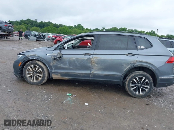 2022 Volkswagen Tiguan S with VIN 3VV1B7AX9NM005125, listed as a IAAI auction lot 42371110 with 94,060 mi miles and . Bid and sale history available at DreamBid. Image 14.