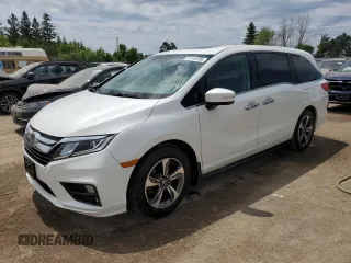 2020 Honda Odyssey with VIN 5FNRL6H42LB503057, listed as a Copart auction lot 61740705 with 100,593 mi miles and Clean title. Bid and sale history available at DreamBid. Image 1.