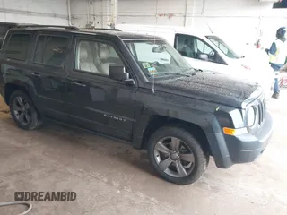 2015 Jeep Patriot High Altitude with VIN 1C4NJPFA2FD106656, listed as a IAAI auction lot 42142509 with 166,464 mi miles and . Bid and sale history available at DreamBid. Image 1.