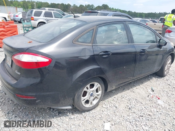 2014 Ford Fiesta SE z VIN 3FADP4BJXEM232657, wystawiony jako IAAI lot #42132147 z przebiegiem 290 396 mil mil oraz . Historia ofert i sprzedaży dostępna na DreamBid. Obrazek 4.