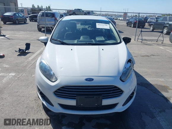 2019 Ford Fiesta SE z VIN 3FADP4BJ6KM143891, wystawiony jako IAAI lot #42244796 z przebiegiem 62 143 mil mil oraz . Historia ofert i sprzedaży dostępna na DreamBid. Obrazek 13.
