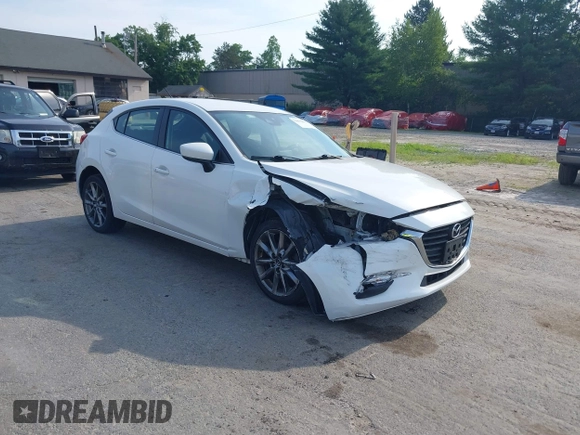 2018 Mazda 3 Touring z VIN 3MZBN1L35JM210093, wystawiony jako IAAI lot #39810891 z przebiegiem 110 052 mil mil oraz . Historia ofert i sprzedaży dostępna na DreamBid. Obrazek 1.