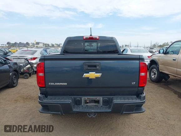 2019 Chevrolet Colorado 2WD LT with VIN 1GCGSCEAXK1191130, listed as a IAAI auction lot 42023742 with 86,914 mi miles and . Bid and sale history available at DreamBid. Image 16.